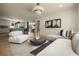 Open concept living space with hardwood floors and view into the kitchen with large island at 1155 Peachtree Battle Nw Ave, Atlanta, GA 30327