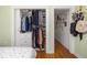 Bright bedroom closet with ample storage space and built-in shelving for organization at 737 Barnett Ne St # B6, Atlanta, GA 30306