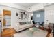 Cozy living room showcasing hardwood floors and ample wall decor at 737 Barnett Ne St # B6, Atlanta, GA 30306