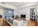 Open living room with hardwood floors and lots of natural light at 737 Barnett Ne St # B6, Atlanta, GA 30306