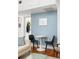 Cozy seating area with hardwood floors and blue accent wall at 737 Barnett Ne St # B6, Atlanta, GA 30306