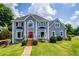 Aerial view of a well-maintained property with a beautiful pool and lush green lawn in a serene neighborhood at 11 Chad Ct, Mcdonough, GA 30253