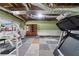 Unfinished basement featuring wood beams and workout machines at 11 Chad Ct, Mcdonough, GA 30253