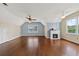 Large bedroom with dual windows, hardwood flooring, and ceiling fans at 11 Chad Ct, Mcdonough, GA 30253