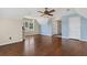 Bonus room with hardwood floors, ceiling fans, and bright windows at 11 Chad Ct, Mcdonough, GA 30253