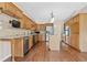 Traditional-style kitchen with wooden cabinets, stainless steel appliances, and a functional center island at 11 Chad Ct, Mcdonough, GA 30253