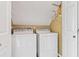 Functional laundry room featuring a washer and dryer unit at 11 Chad Ct, Mcdonough, GA 30253