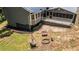 An upper angle shows the backyard and firepit, plus a partially finished basement level at 261 Clayton Trl, Canton, GA 30114