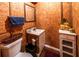 Small bathroom with toilet, sink and cabinet with decorative elements at 261 Clayton Trl, Canton, GA 30114