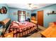 Bedroom with a decorative bed and ample light at 261 Clayton Trl, Canton, GA 30114