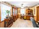 The dining room features an ornate hutch, natural light, and decorative wallpaper at 261 Clayton Trl, Canton, GA 30114
