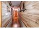 Hallway with decorative light fixtures and wooden wall decor at 261 Clayton Trl, Canton, GA 30114
