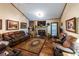Cozy living room with fireplace, hardwood floors, and vaulted ceilings at 261 Clayton Trl, Canton, GA 30114