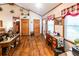 The living room features hardwood flooring, a small desk and exterior doors at 261 Clayton Trl, Canton, GA 30114