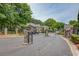 Gated entrance to the Elizabeth Heights Community, featuring stone pillars and black metal gates at 405 Brighton Pt, Atlanta, GA 30328