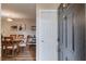 Entryway view with hardwood flooring leading into the dining area of this light and bright home at 405 Brighton Pt, Atlanta, GA 30328