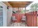 Cozy patio area with chairs and a view of the complex's stairs and walkway at 405 Brighton Pt, Atlanta, GA 30328
