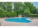 Community pool with ample seating and lounge chairs, perfect for relaxation at 405 Brighton Pt, Atlanta, GA 30328