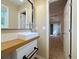 Stylish bathroom showcasing a vanity with a modern vessel sink and a framed mirror at 413 Old Brock Rd, Rockmart, GA 30153