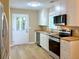 Beautiful kitchen with stainless steel appliances, white cabinets, and modern finishes at 413 Old Brock Rd, Rockmart, GA 30153