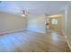 Spacious living room with modern wood-look flooring and neutral paint, offering a versatile living space at 413 Old Brock Rd, Rockmart, GA 30153