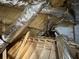 View of attic featuring spray foam insulation, ductwork and rafters at 4185 Lenox Park Dr, Buford, GA 30519