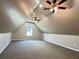 Upstairs bonus room with multiple ceiling fans, recessed lighting, and neutral carpeting at 4185 Lenox Park Dr, Buford, GA 30519