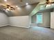 Upstairs bonus room with multiple ceiling fans, recessed lighting, and neutral carpeting at 4185 Lenox Park Dr, Buford, GA 30519