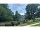 Charming two-story home with mature landscaping at 4185 Lenox Park Dr, Buford, GA 30519