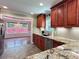Kitchen featuring custom cabinets, granite countertops and stainless steel appliances at 4185 Lenox Park Dr, Buford, GA 30519
