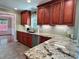 Kitchen featuring custom cabinets, granite countertops and stainless steel appliances at 4185 Lenox Park Dr, Buford, GA 30519