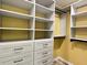 Custom closet with ample shelving and drawers for optimal storage at 4185 Lenox Park Dr, Buford, GA 30519