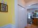 Hallway with closet and views of kitchen at 574 Friars Head Dr, Suwanee, GA 30024