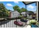 Private balcony with view of parking, common areas, and brick buildings at 6851 Roswell Rd # F5, Sandy Springs, GA 30328