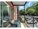 Private balcony with comfortable seating overlooking the landscaped yard at 6851 Roswell Rd # F5, Sandy Springs, GA 30328