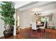 Elegant dining room with hardwood floors and decorative chandelier at 6851 Roswell Rd # F5, Sandy Springs, GA 30328