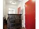 Hallway featuring hardwood floors, a mirror, and an antique cabinet at 6851 Roswell Rd # F5, Sandy Springs, GA 30328
