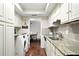 Bright kitchen with granite countertops and stainless steel appliances at 6851 Roswell Rd # F5, Sandy Springs, GA 30328