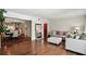 Bright living room with hardwood floors, mirror and connecting dining room at 6851 Roswell Rd # F5, Sandy Springs, GA 30328
