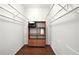 Spacious walk-in closet with custom shelving and ample storage at 6851 Roswell Rd # F5, Sandy Springs, GA 30328