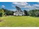 Picture of the two-story exterior of the house with a spacious lawn at 1611 Alcovy Station Rd, Covington, GA 30014