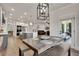Open concept kitchen and dining area features a large island with seating and access to an outdoor porch at 1611 Alcovy Station Rd, Covington, GA 30014
