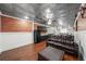 Finished basement features a kitchenette, leather seating, and stylish accents at 454 Pine Bluff Dr, Dallas, GA 30157