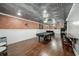 Finished basement includes a recreation area, kitchenette, and ample seating at 454 Pine Bluff Dr, Dallas, GA 30157
