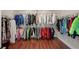 Walk-in closet with dual rods for ample storage at 454 Pine Bluff Dr, Dallas, GA 30157