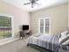 Guest bedroom with carpet, natural light, and vaulted ceiling with ceiling fan at 570 Mcgarity Dr, Mcdonough, GA 30252