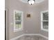 Cozy breakfast nook with two windows providing natural light and a view of the outdoors at 570 Mcgarity Dr, Mcdonough, GA 30252