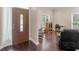 Comfortable living room area featuring hardwood flooring and relaxing furniture at 570 Mcgarity Dr, Mcdonough, GA 30252