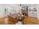 Inviting living room with stone fireplace, built-in shelving, hardwood floors, and lots of light at 214 Trecastle Sq, Canton, GA 30114