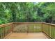 Enjoy lush backyard views from this spacious deck; great for entertaining and relaxing outdoors at 381 New Jersey Ave Nw, Atlanta, GA 30314
